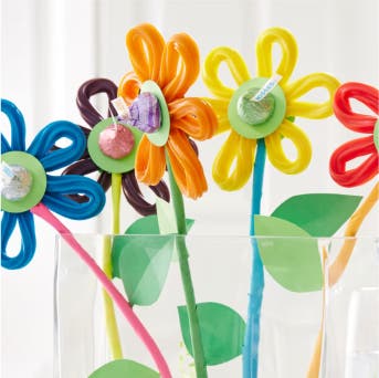 craft flowers made out of twizzlers and construction paper