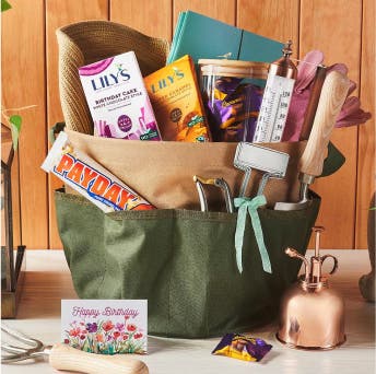 hersheys gardening themed basket filled with tools and assorted hersheys candy