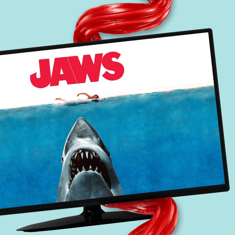 Shark on TV in front of Twizzlers Candy