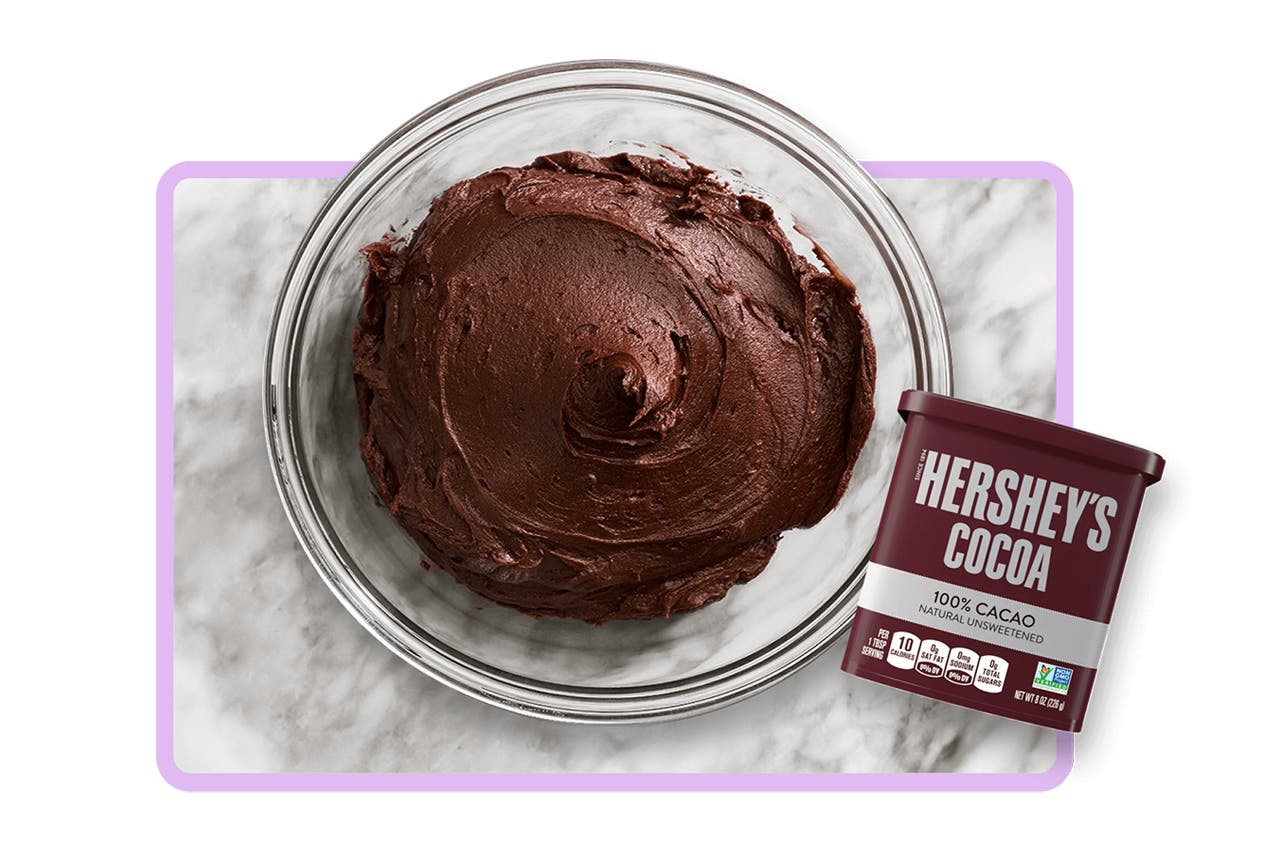 bowl of chocolate frosting made with hersheys cocoa