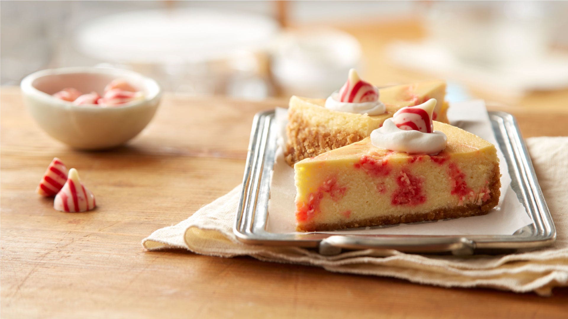 Image of KISSES Candy Cane Swirl Cheesecake