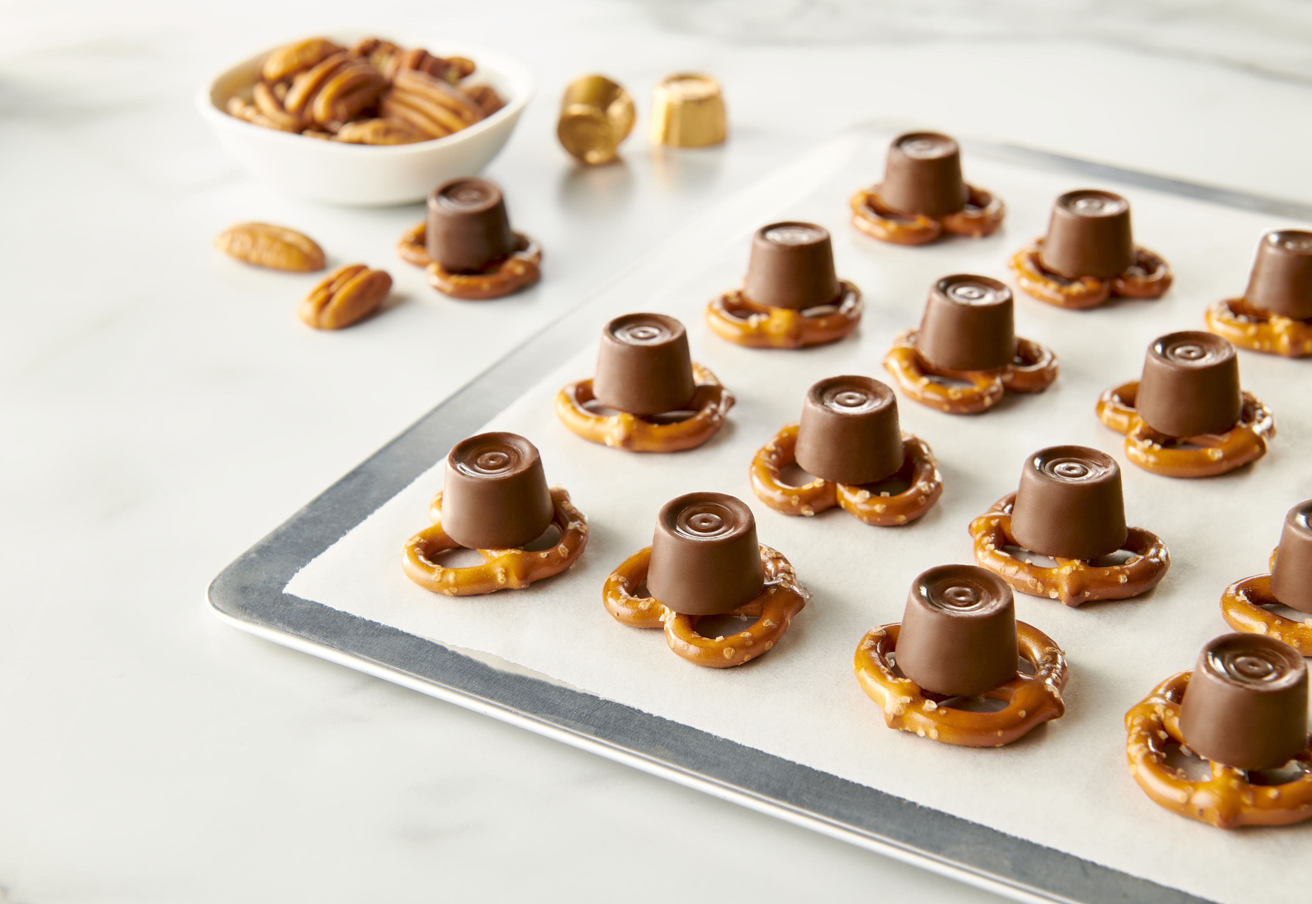 tray of small pretzel twists topped with rolo creamy caramels