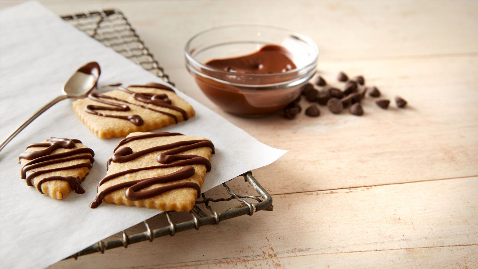 chocolate drizzled peanut butter cutout cookies