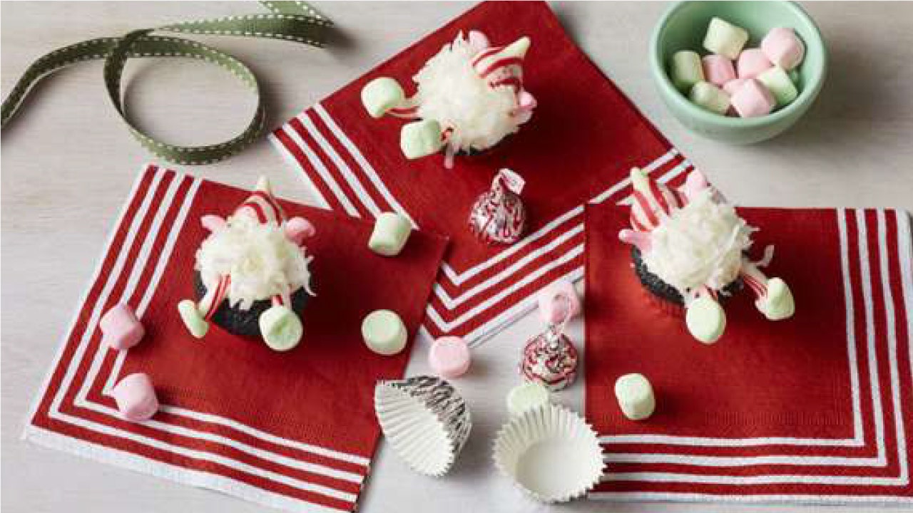 Image of HERSHEY'S KISSES Snowball Elf Cupcakes