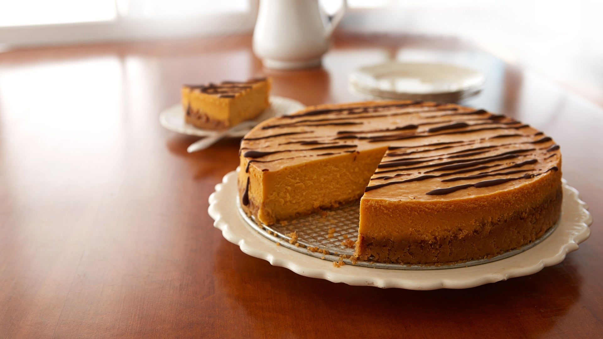 butterscotch cheesecake with chocolate drizzle