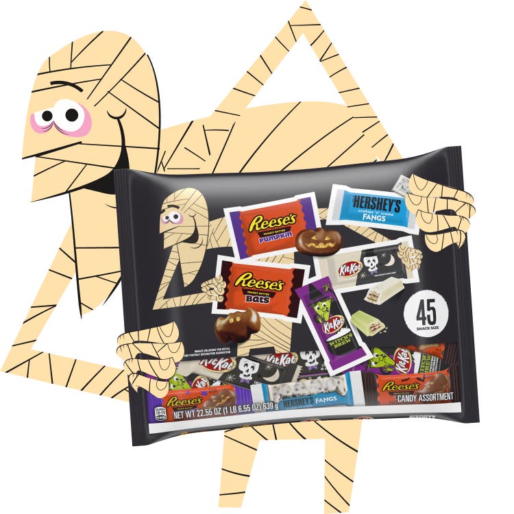 mummy holding bag of assorted hersheys halloween candies