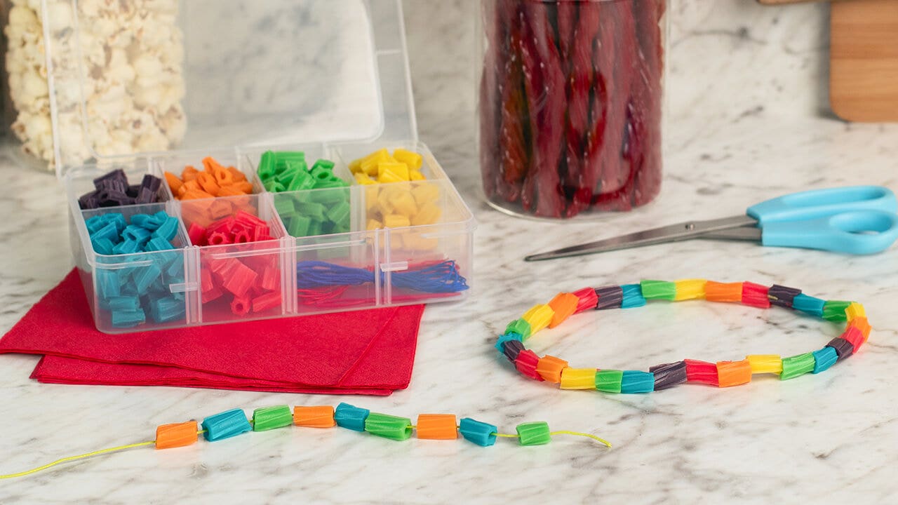 rainbow twizzlers cut into small pieces to use as jewelry pieces