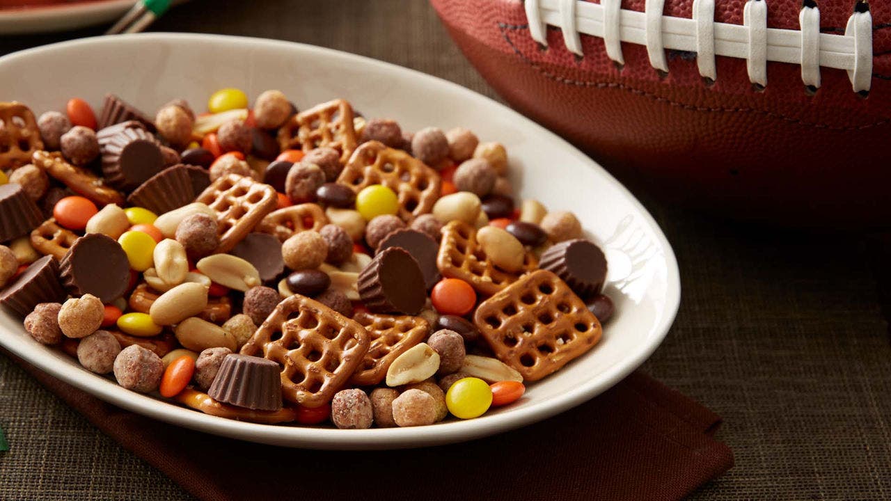 bowl of sports themed sweet and salty snack mix